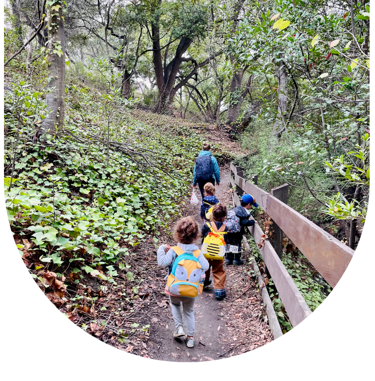 Enthusiastic young learners on a captivating field trip, immersed in hands-on exploration and discovery, similar to the Montessori philosophy of outdoor education.